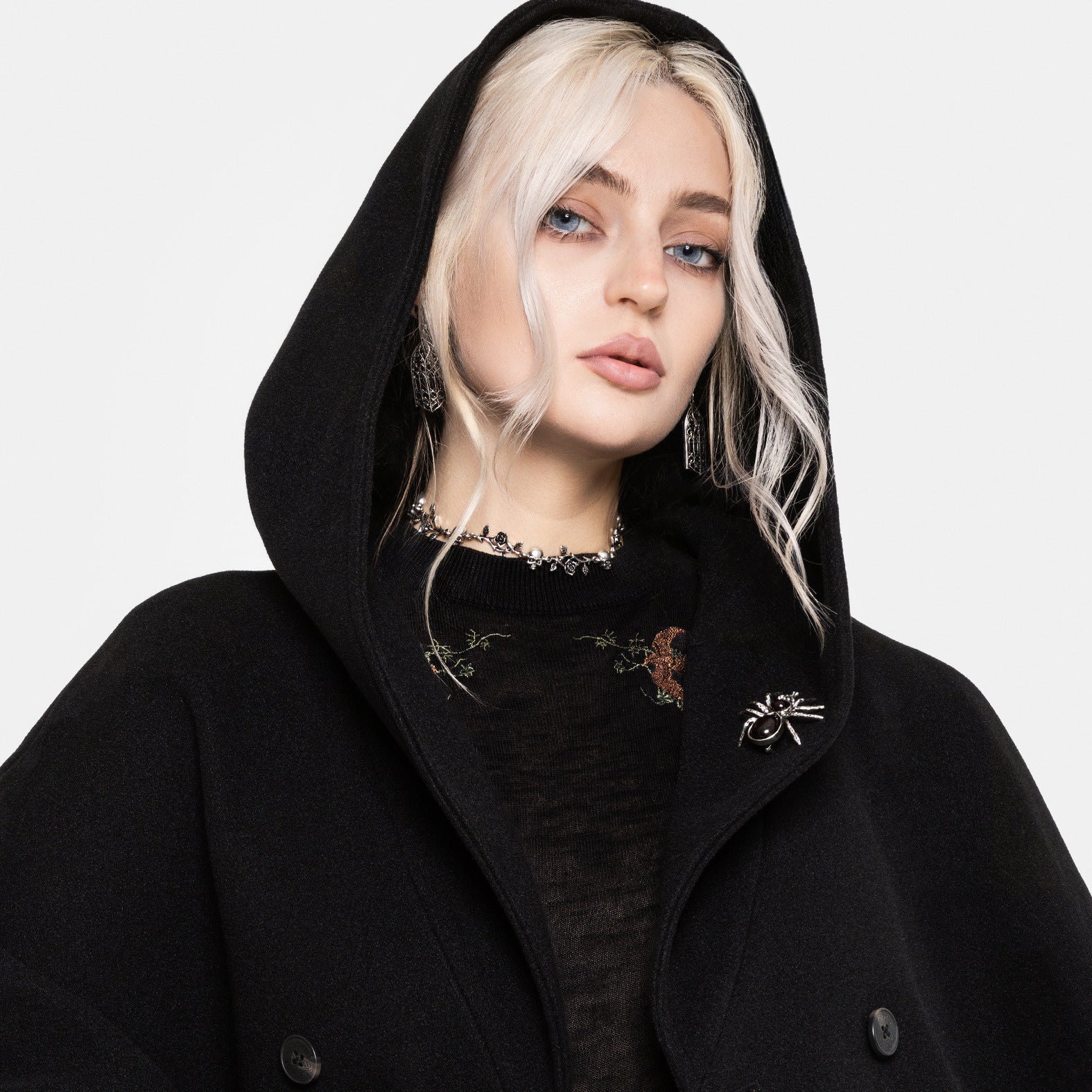 HOODED MYSTIQUE