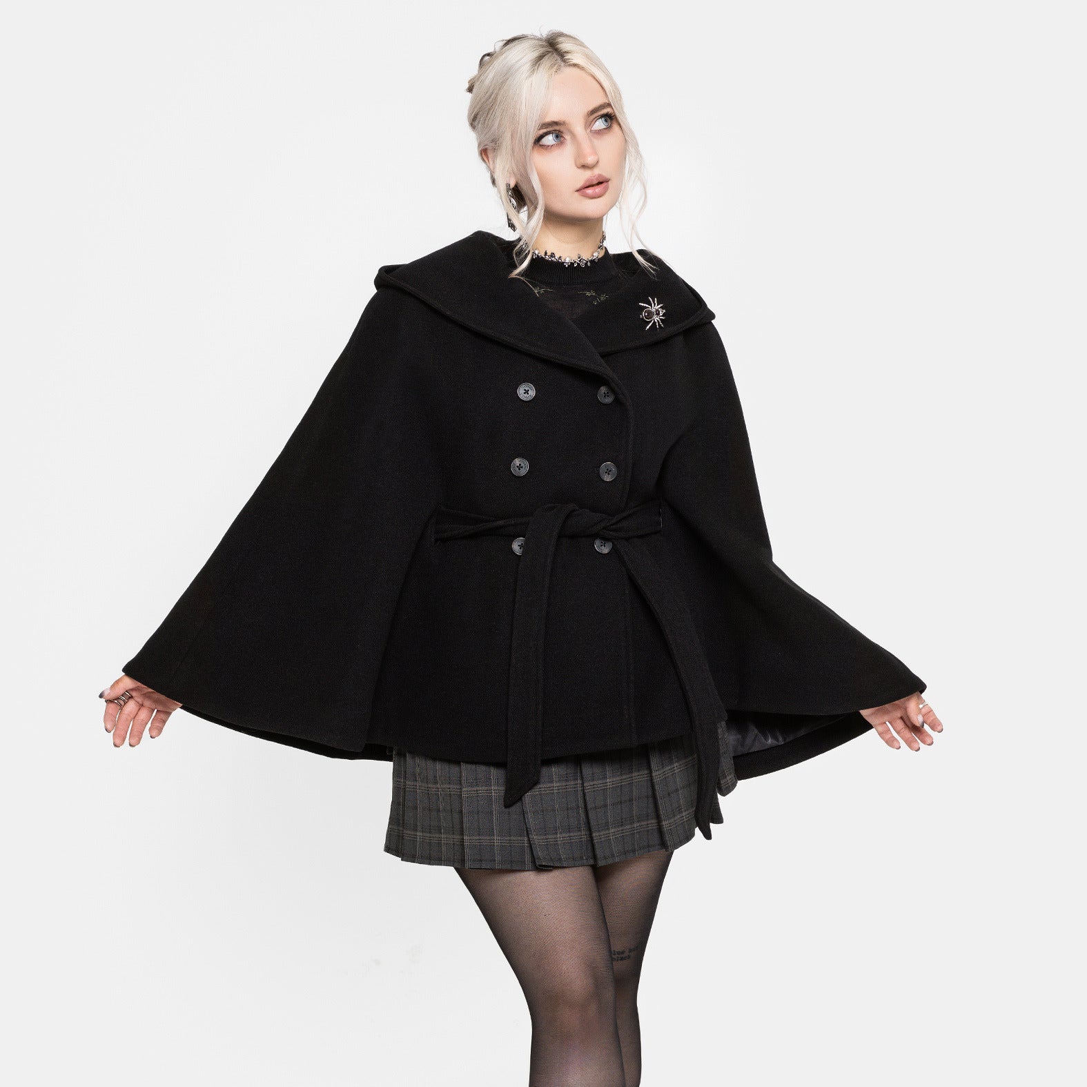 CLOAKED IN BLACK