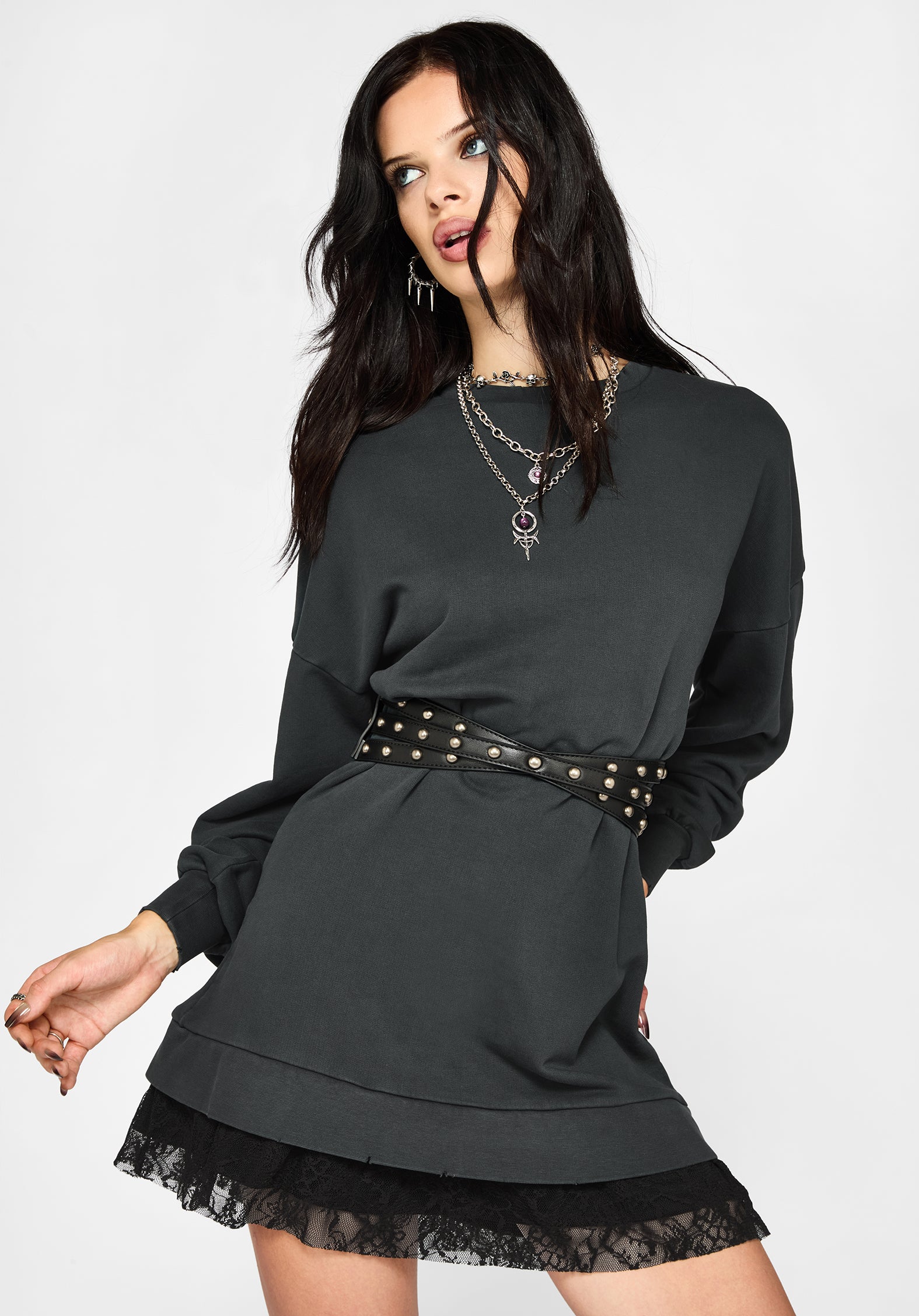 sweater over lace dress a chic way to style a lace dress when it's cold out