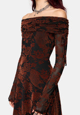 An off-the-shoulder long-sleeve mini dress featuring a burnt orange flocked pattern and black base, shown on a model against a light gray background.