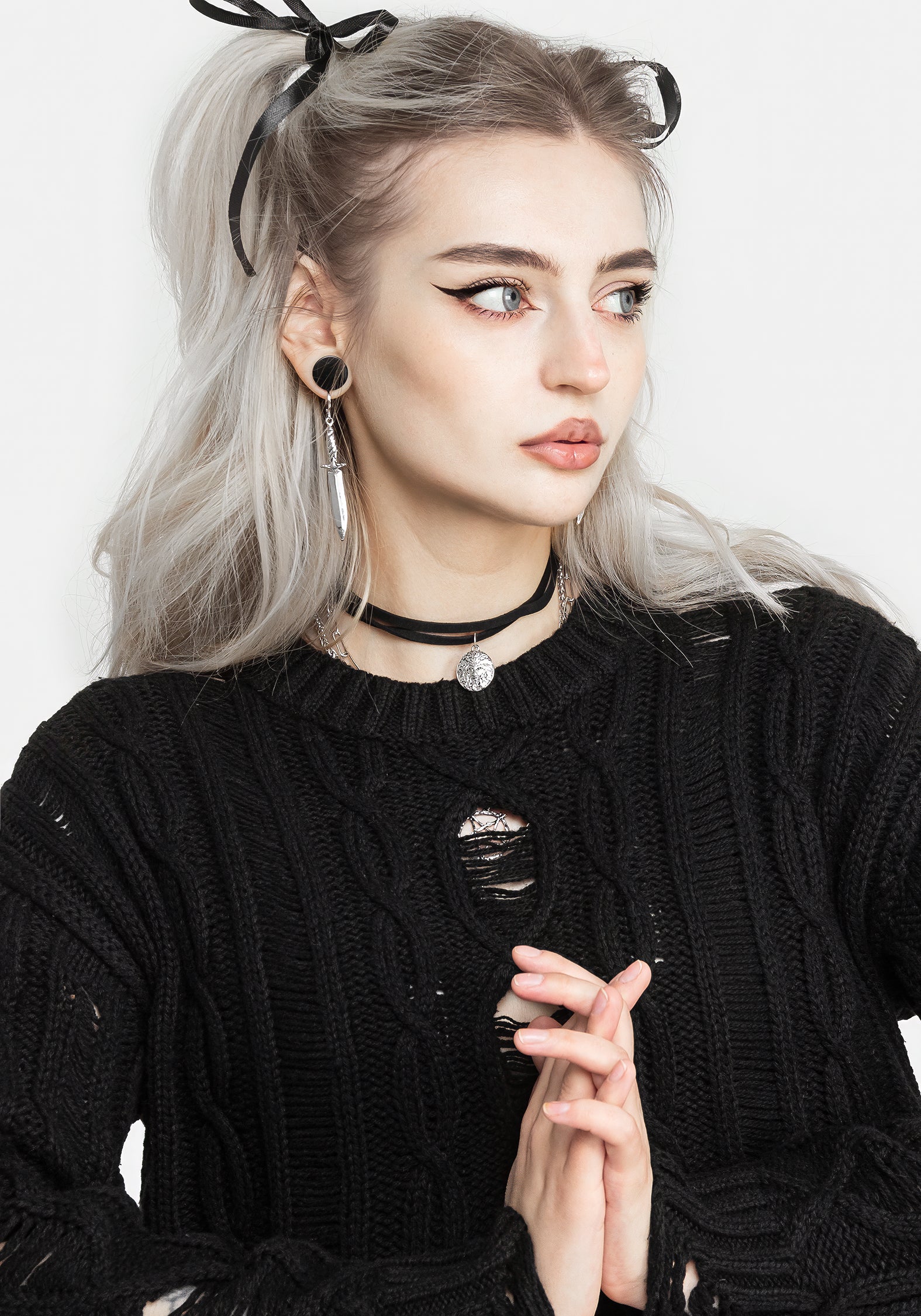 Nemesis Distressed Cable Knit Sweater