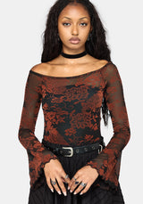 A woman modeling a black and rust red floral lace off-the-shoulder long-sleeve top with a black choker and belt, against a light gray background.